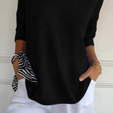 Lumikeuze™ | Effen kleur gebreide top met V-hals