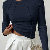 The Clair™ | Langærmet top med ribbet piping